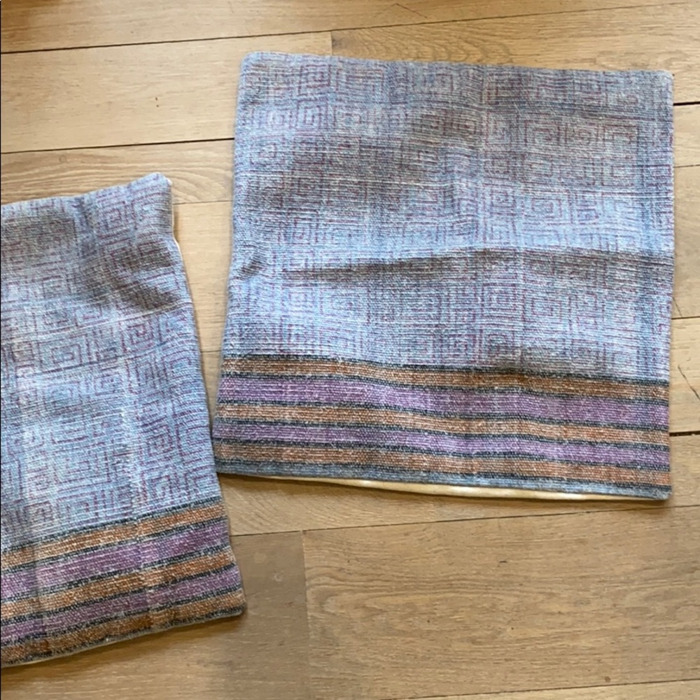 Two matching pillow covers